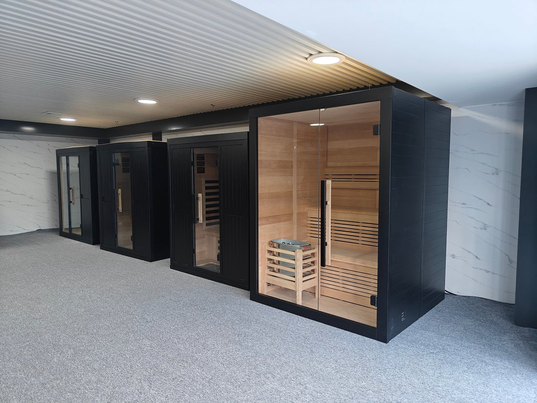 Traditional and infrared sauna cabins in the Valora Spas showroom for sauna cleaning and maintenance guidance