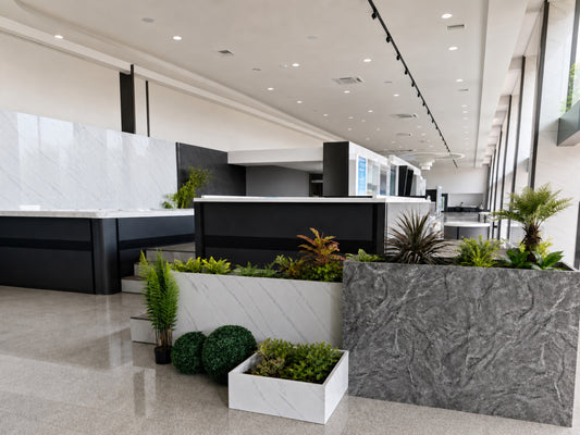 Hot tubs with contrasting shell and cabinet finishes displayed inside the Valora Spas showroom